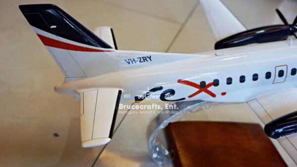 Saab 340 Rex Airlines Aircraft with detailed craftsmanship.